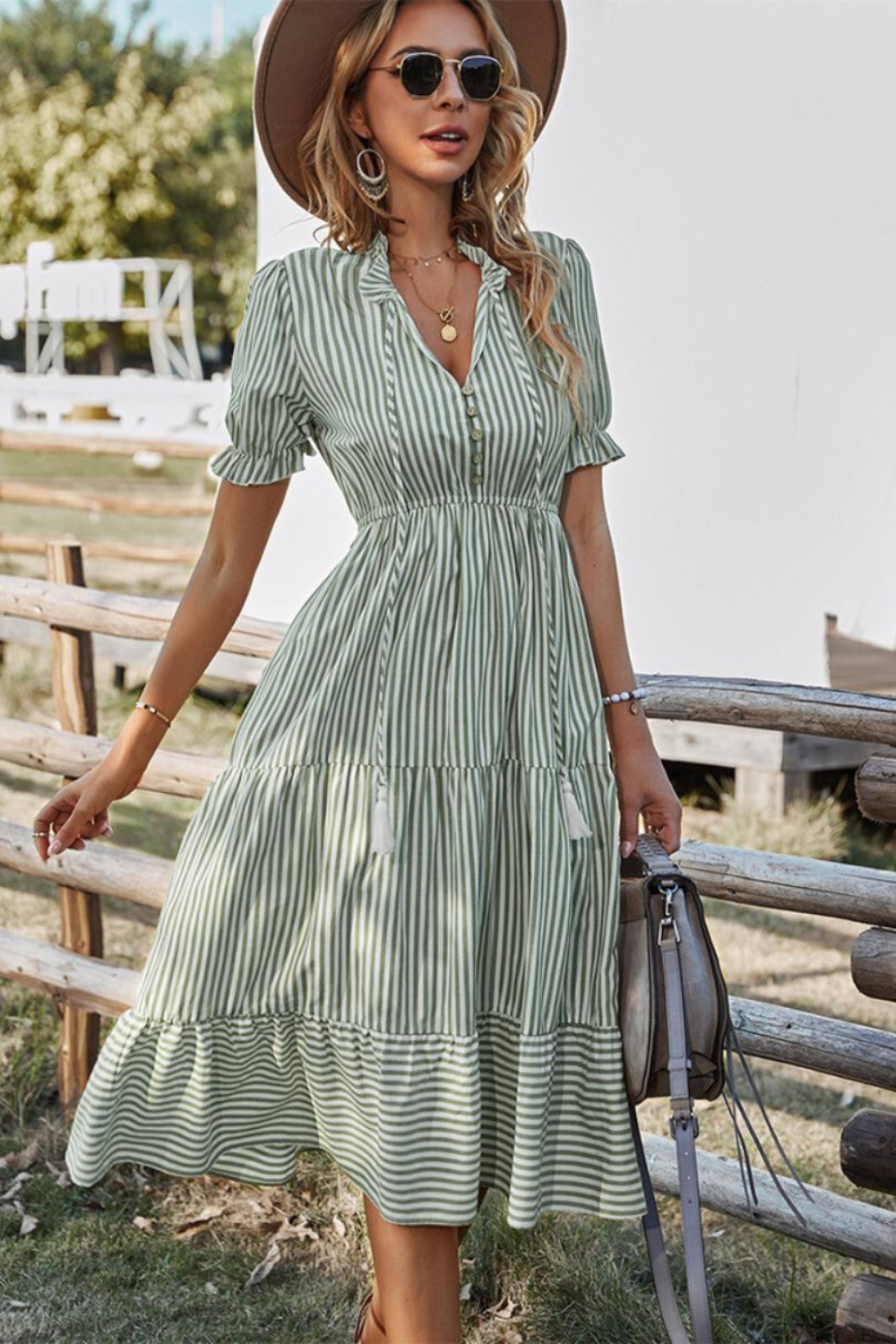 Lucia | Stile Frizzante Elegante con Abito Midi a Righe e Frange per un Look Sofisticato